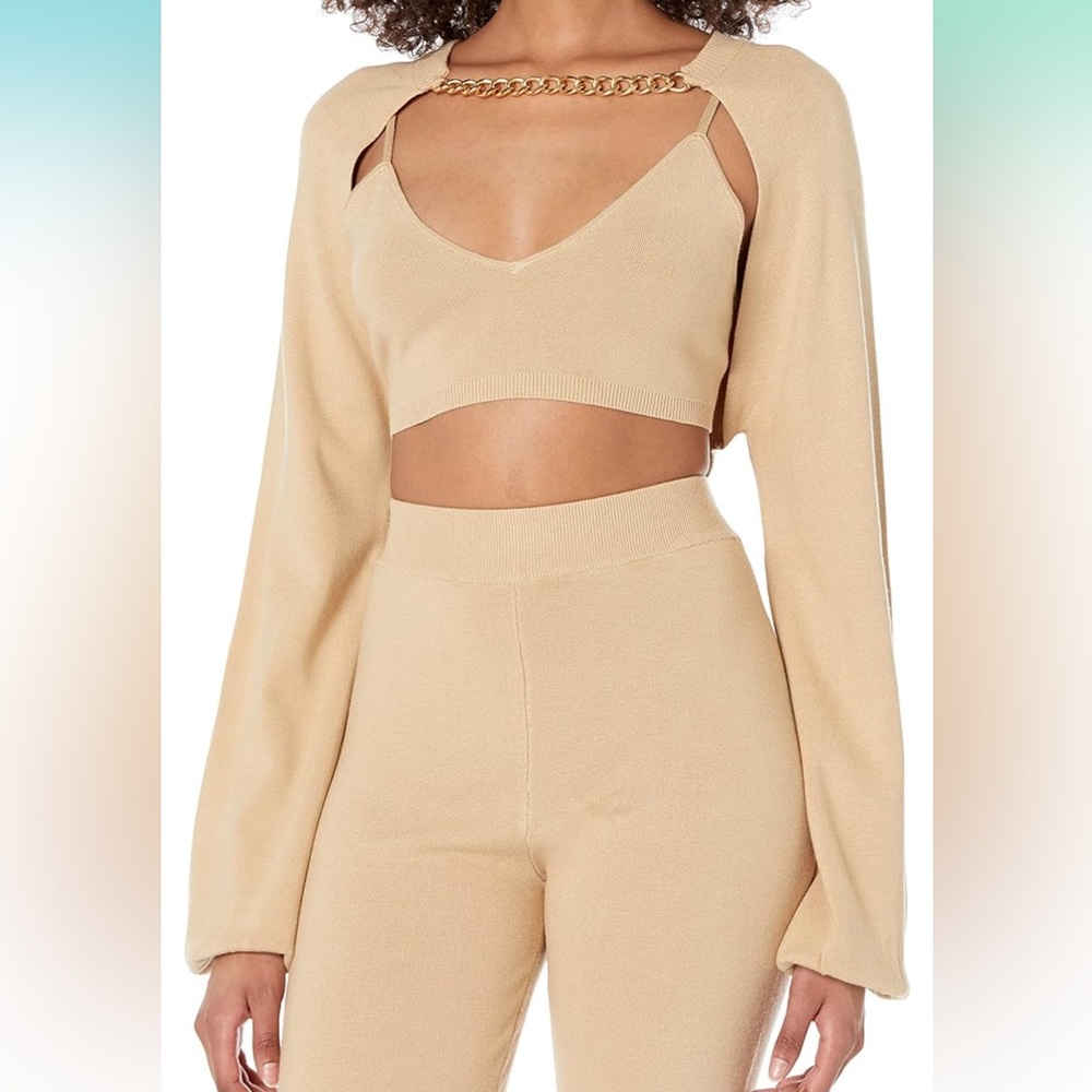 The drop shrug sweater with chain closure